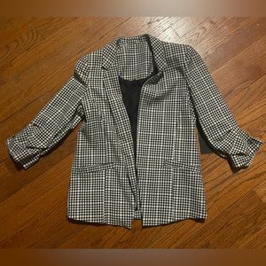 Beautiful brand new blazer with three quarter sleeve